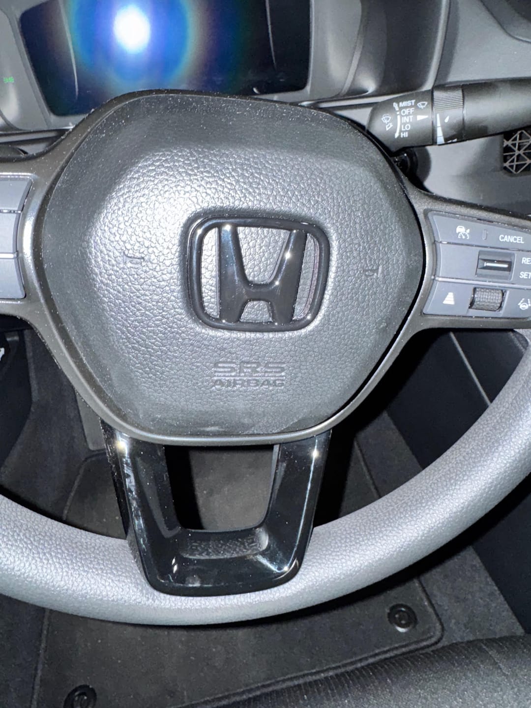 Customer photo review of Black Steering Wheel Emblem Cover
