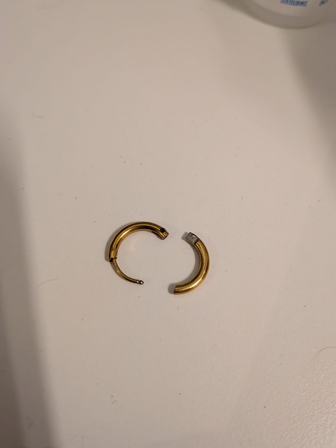 Customer photo review of Kaja - Huggie Hoop Earrings Stainless Steel