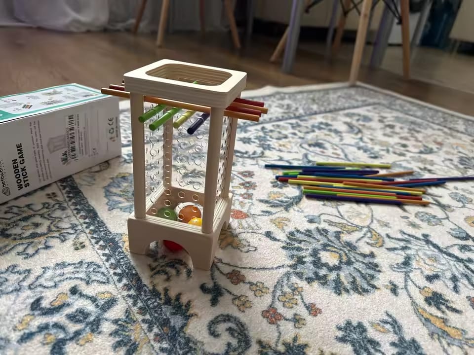 Customer photo review of Tour de bâtonnets en bois Montessori