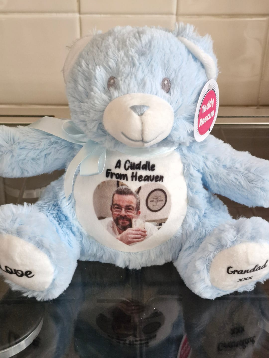 Customer photo review of A Cuddle from Heaven Personalised Photo Teddy Bear