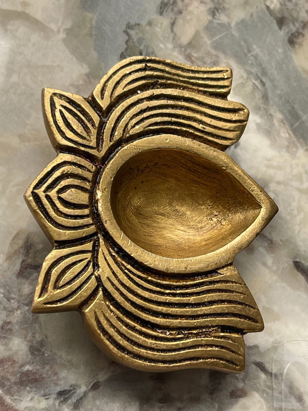 Customer photo review of Brass Lotus Diya – Vastu Pooja Lamp for Prosperity & Harmony | East-North-East Energy Activator | Big - 8 x 6 cm | 200 g