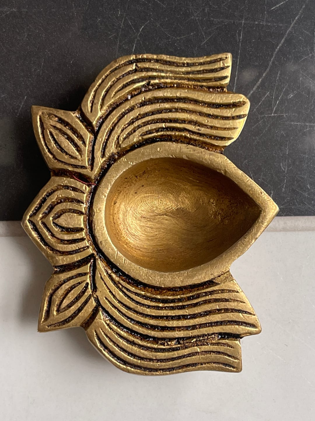 Customer photo review of Brass Lotus Diya – Vastu Pooja Lamp for Prosperity & Harmony | East-North-East Energy Activator | Big - 8 x 6 cm | 200 g