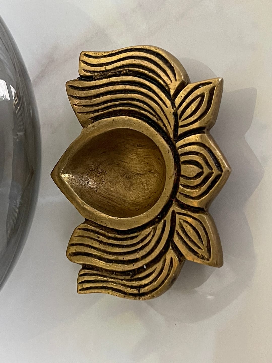 Customer photo review of Brass Lotus Diya – Vastu Pooja Lamp for Prosperity & Harmony | East-North-East Energy Activator | Big - 8 x 6 cm | 200 g