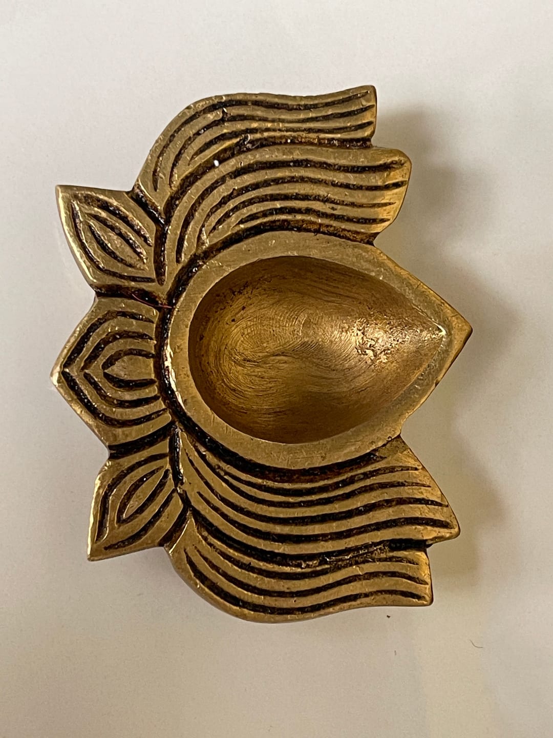 Customer photo review of Brass Lotus Diya – Vastu Pooja Lamp for Prosperity & Harmony | East-North-East Energy Activator | Big - 8 x 6 cm | 200 g