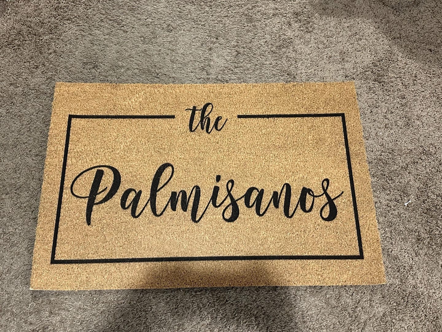 Customer photo review of Personalized Family Name Doormat with Frame