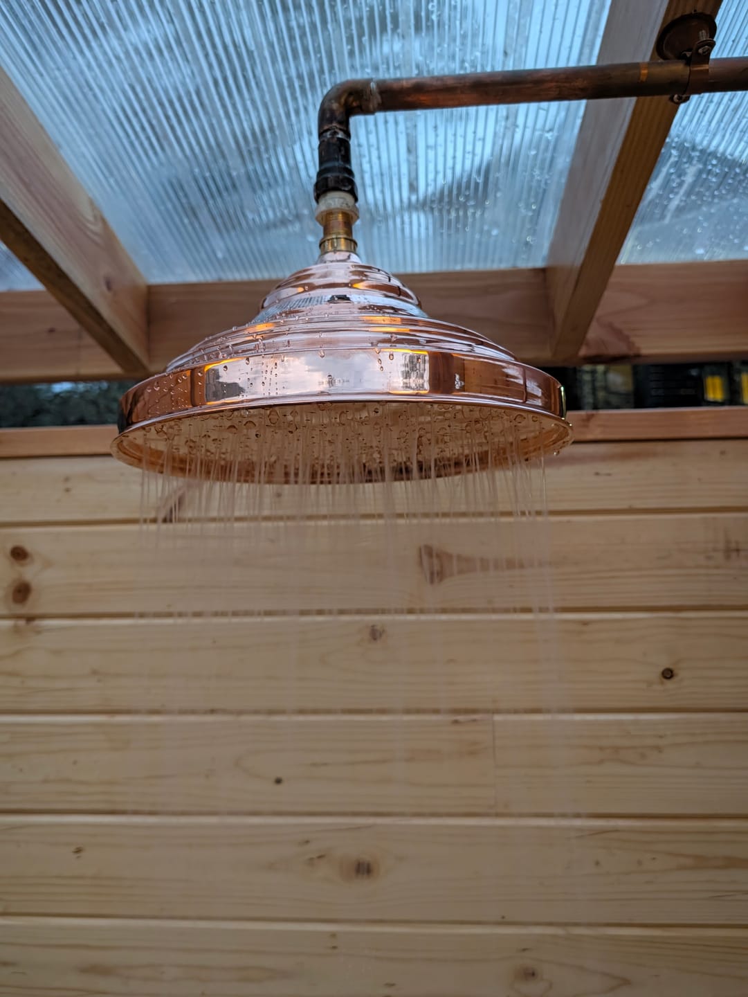 Customer photo review of Unlacquered Copper Showerhead - Natural Copper Rain Shower Head