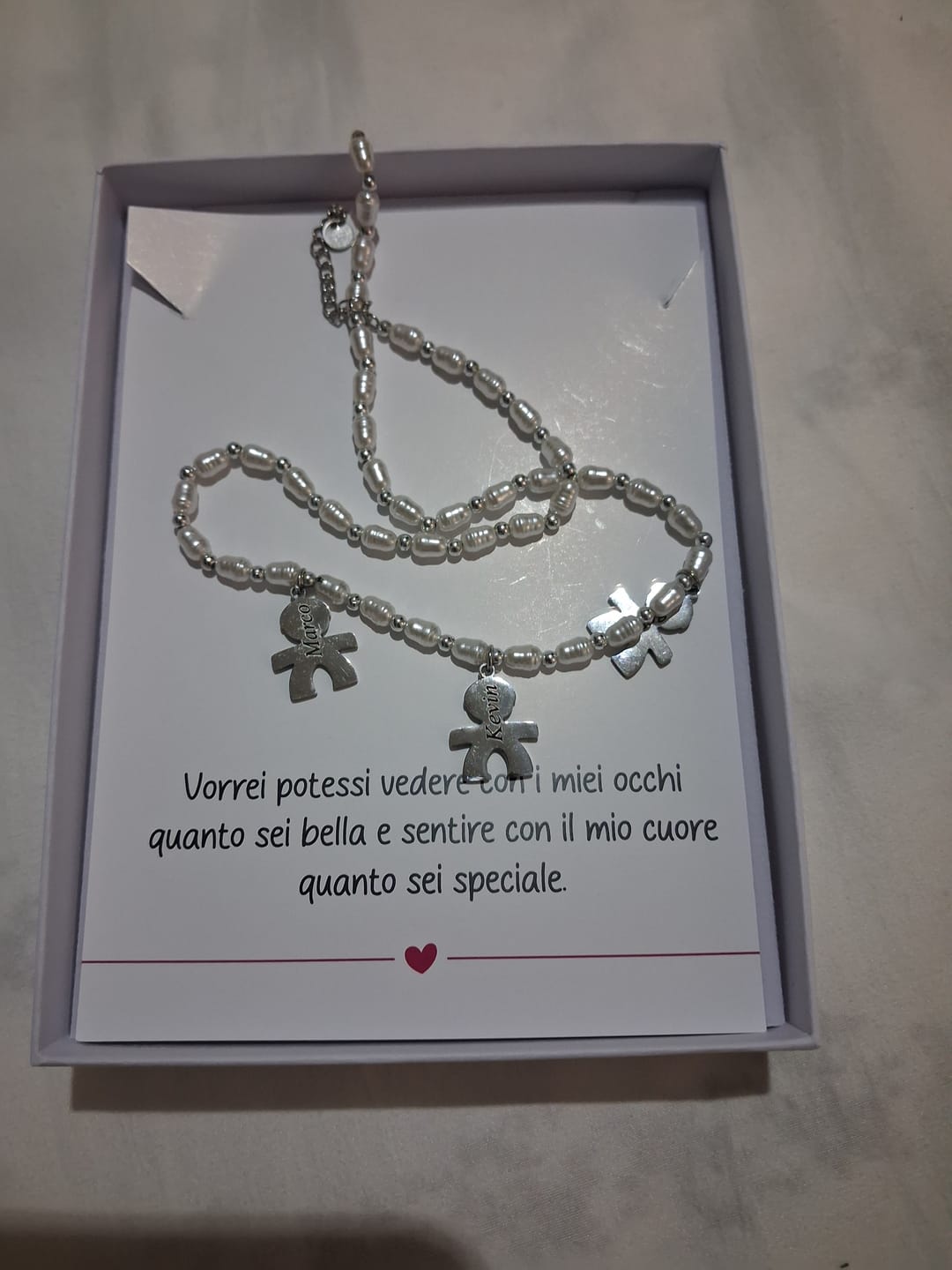 Customer photo review of Girocollo Family In Perle con ciondoli Bimbo Personalizzati