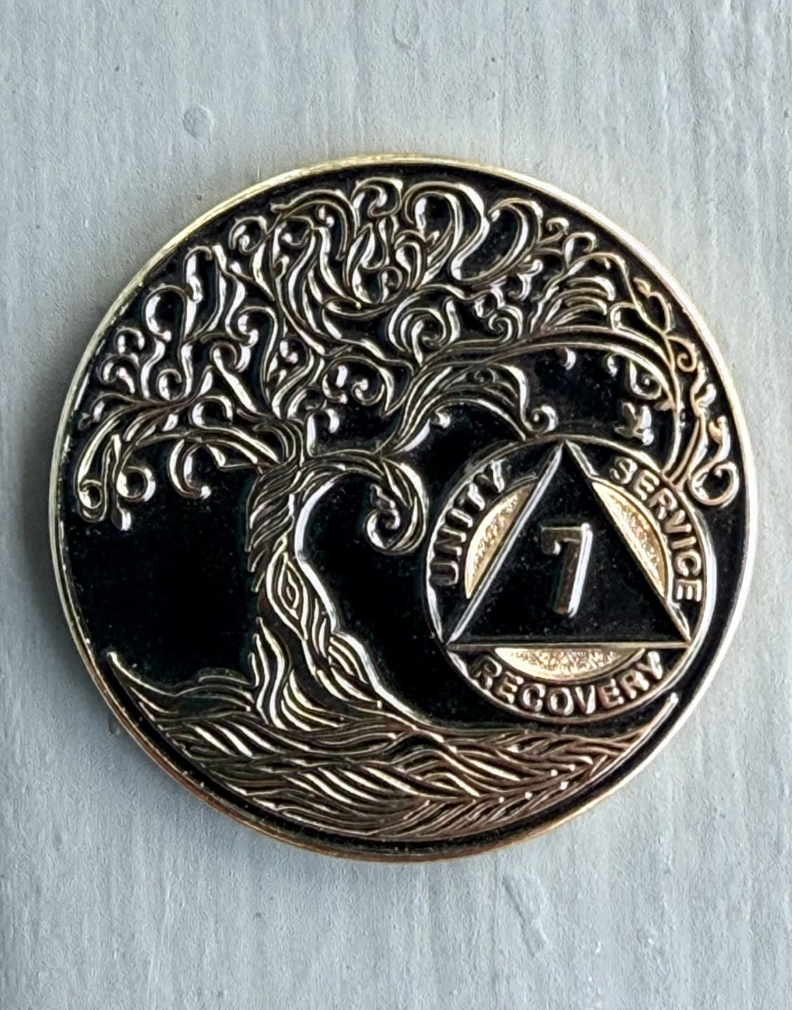 Customer photo review of 7 Year Sobriety Mint Twisted Tree of Life Gold Plated AA Recovery Medallion - Seven Year Chip/Coin - Black