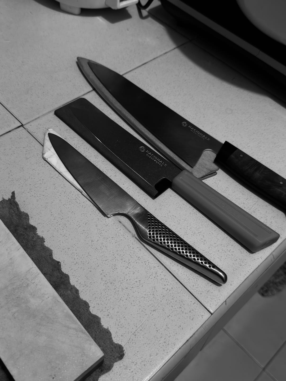 Customer photo review of 180mm Bunka. Nashiji San Mai AUS10 Stainless. Bolstered Midnight Blue Micarta