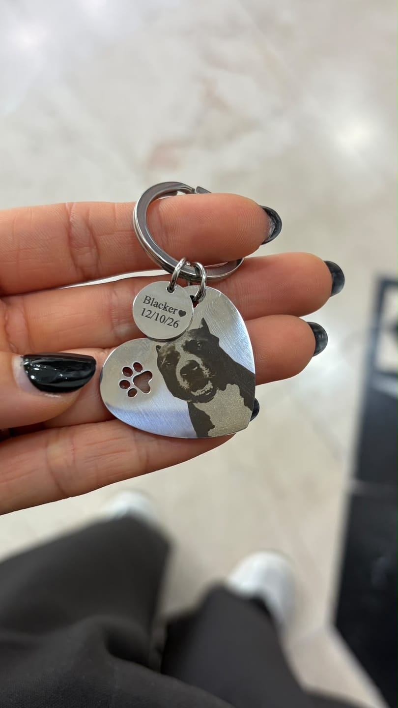 Customer photo review of Llavero corazón y circulo patita de perro acero inoxidable