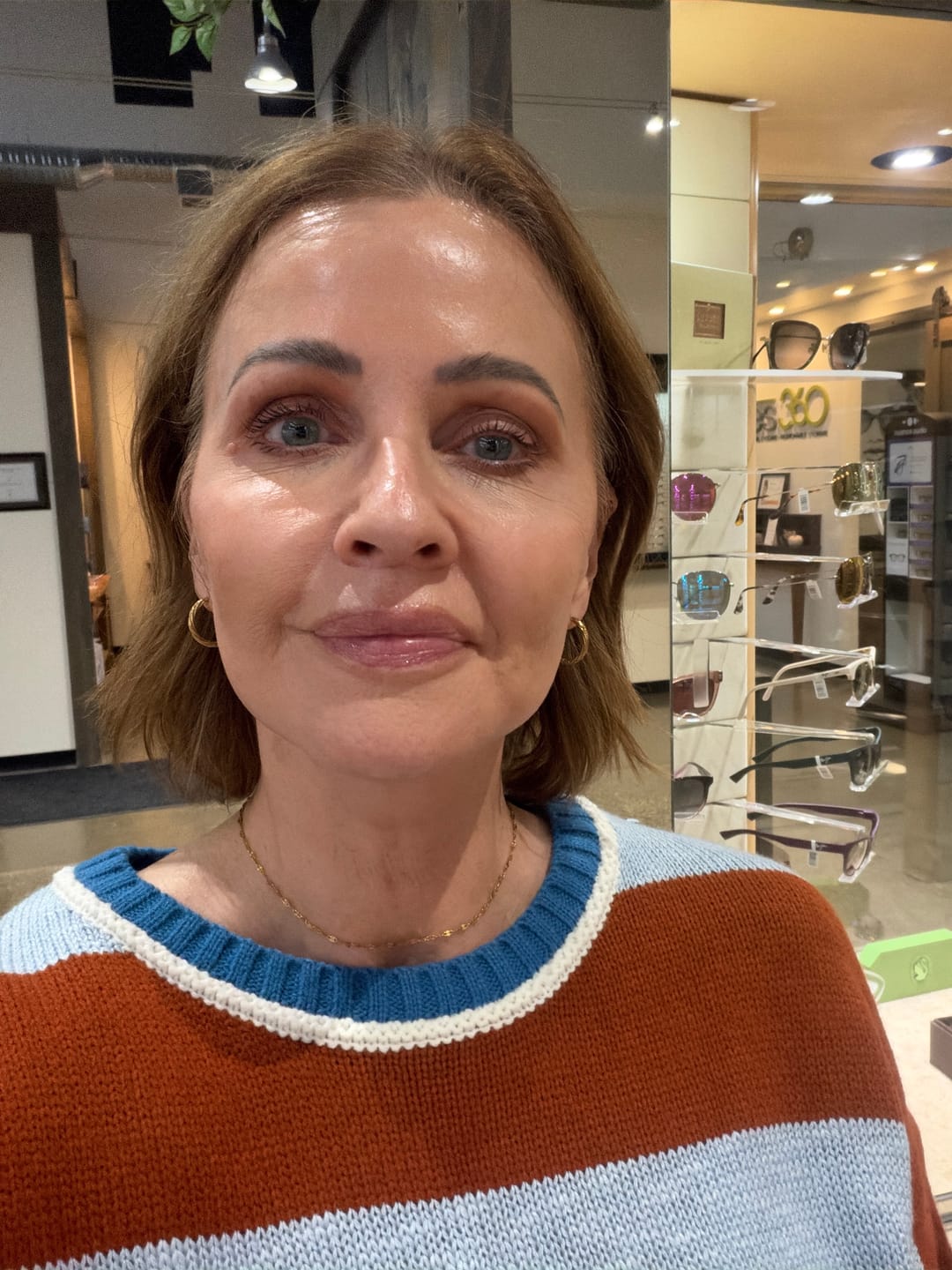 Customer photo review of Icon Earrings