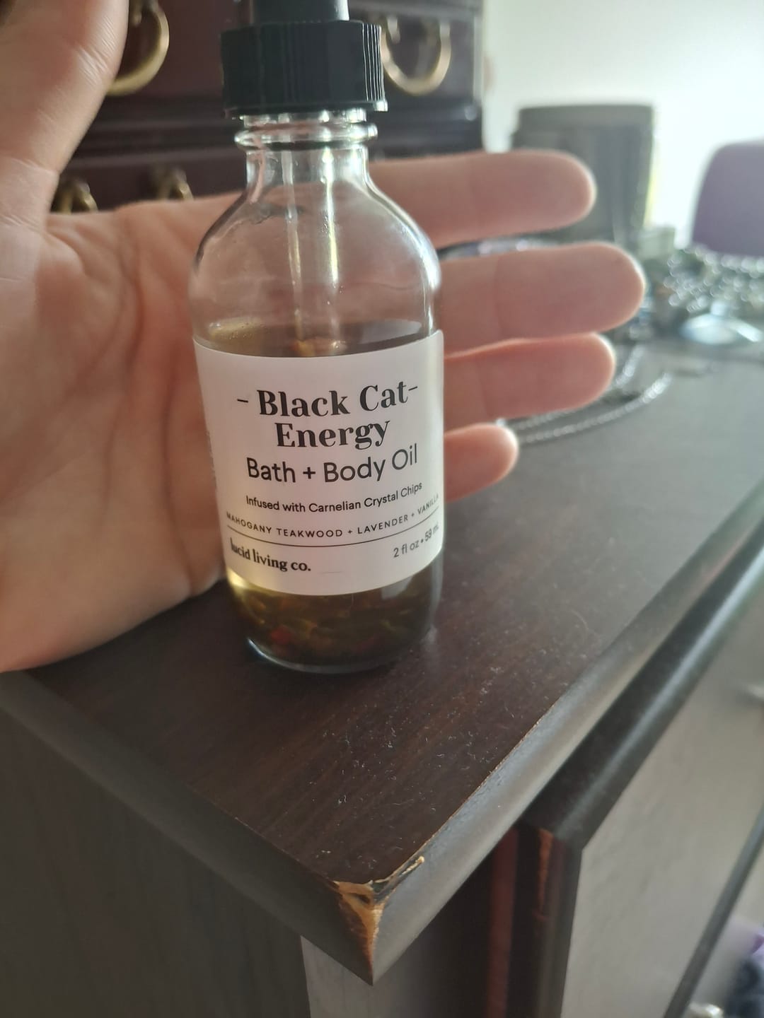 Customer photo review of Black Cat Energy Bath & Body Oil