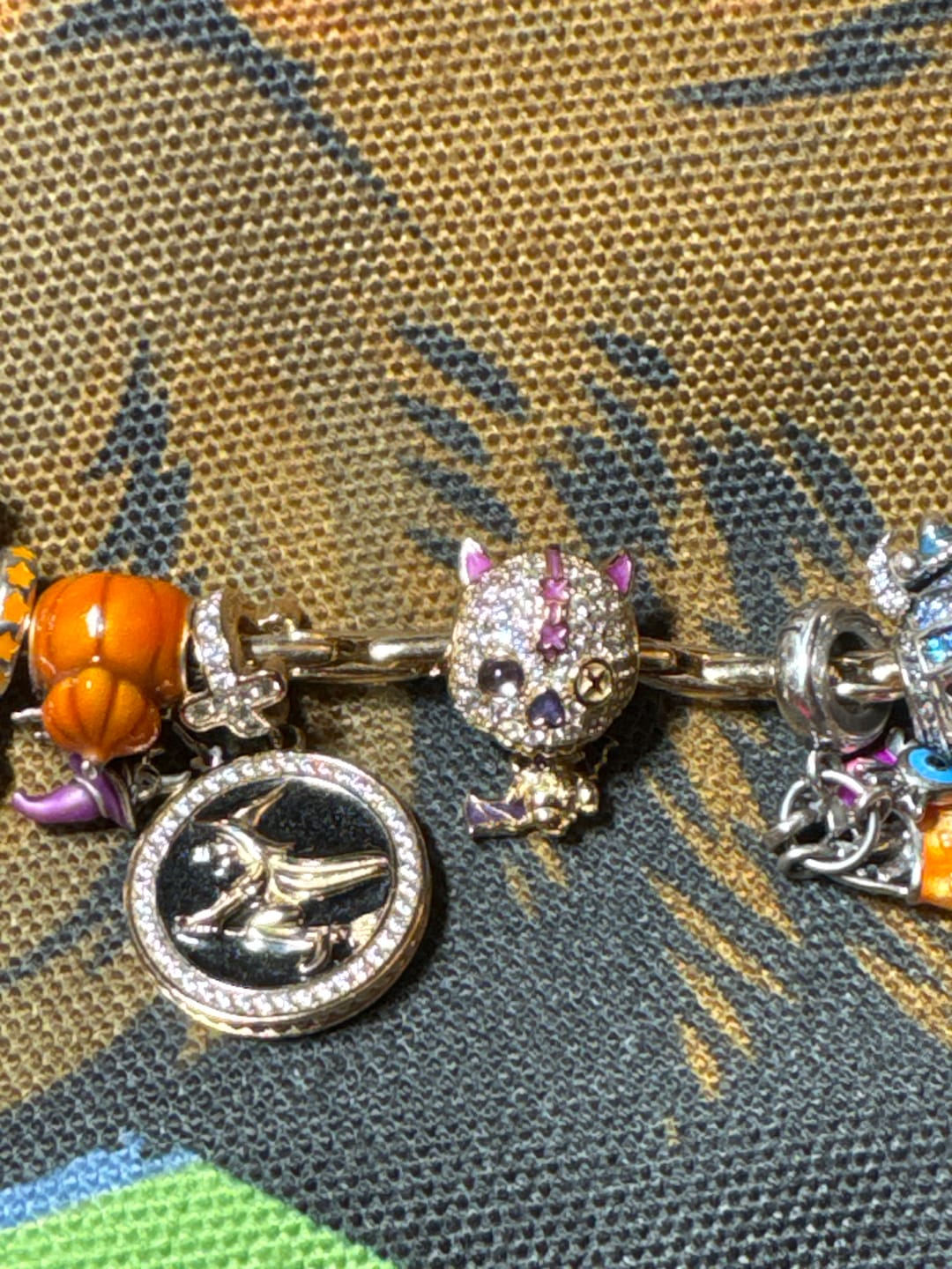 Customer photo review of Luminous Voodoo Cat & Vampire Bat Dangle Charm In Tarnish-Resistant Silver