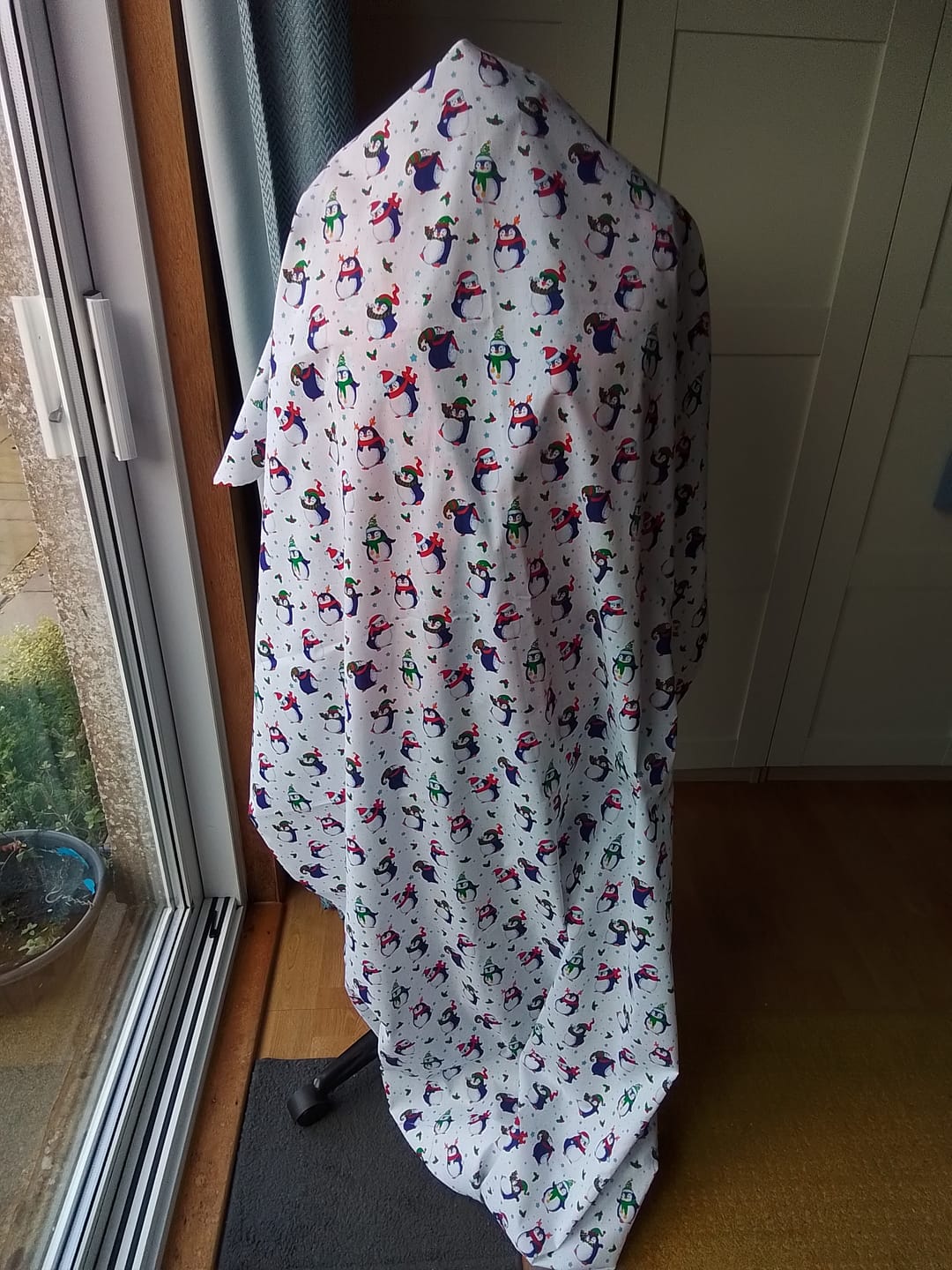 Customer photo review of Christmas Penguins on White Polycotton Fabric