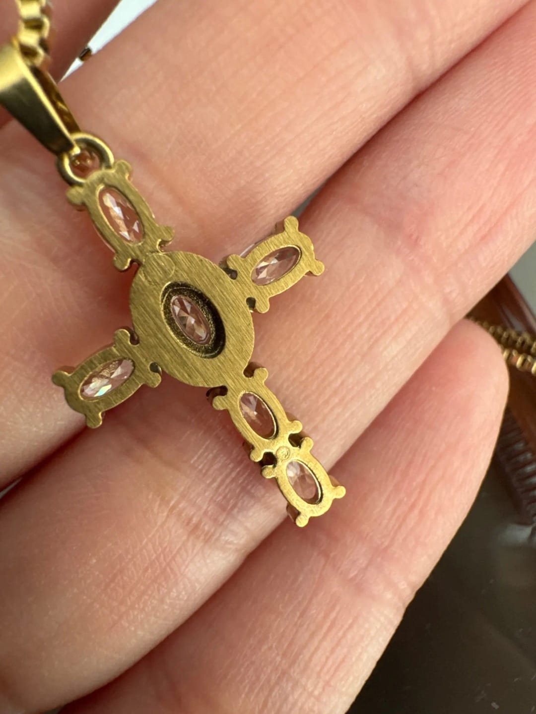Customer photo review of Halo Glow Cross Necklace