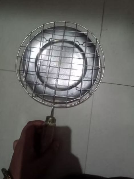 Customer photo review of Stainless Steel Multi-Purpose Roasting Grill/Jali | For Rotis, Papads, Paneer Tikka, Vegetables & more