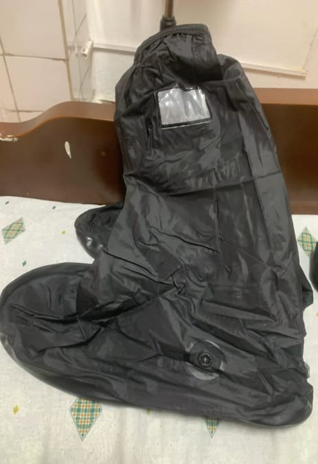 Customer photo review of Cubrebotas impermeable