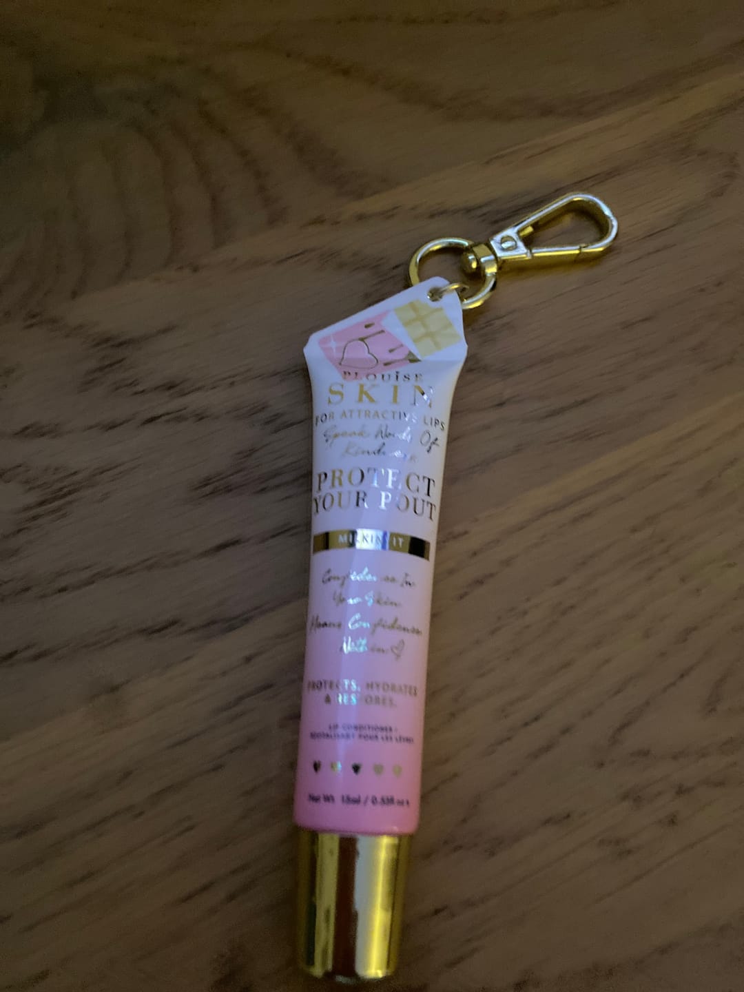 Customer photo review of Protect Your Pout Keychain Lip Conditioner