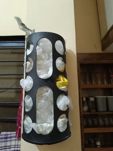 Customer photo review of Wall-Mounted Grocery Bag Dispenser & Multipurpose Kitchen Plastic Bag Organizer