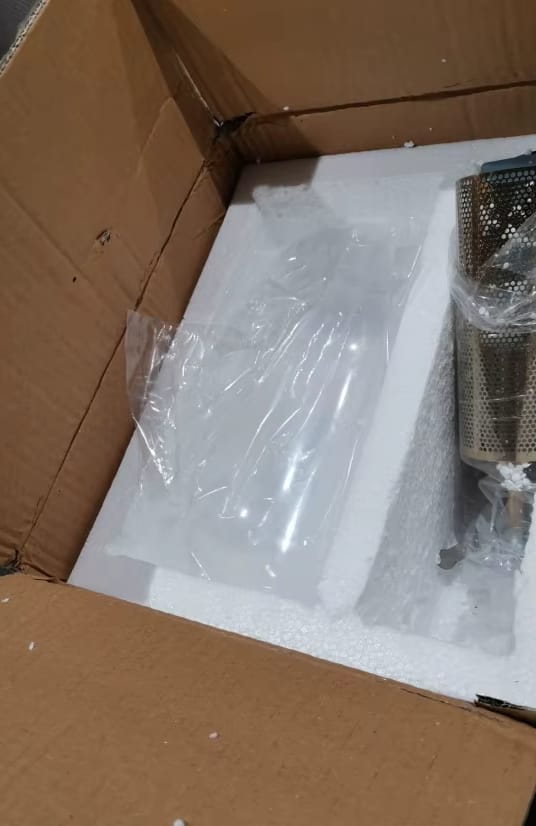 Customer photo review of Gold Tone Glass Wall Light with Hanging Cylinder Shade