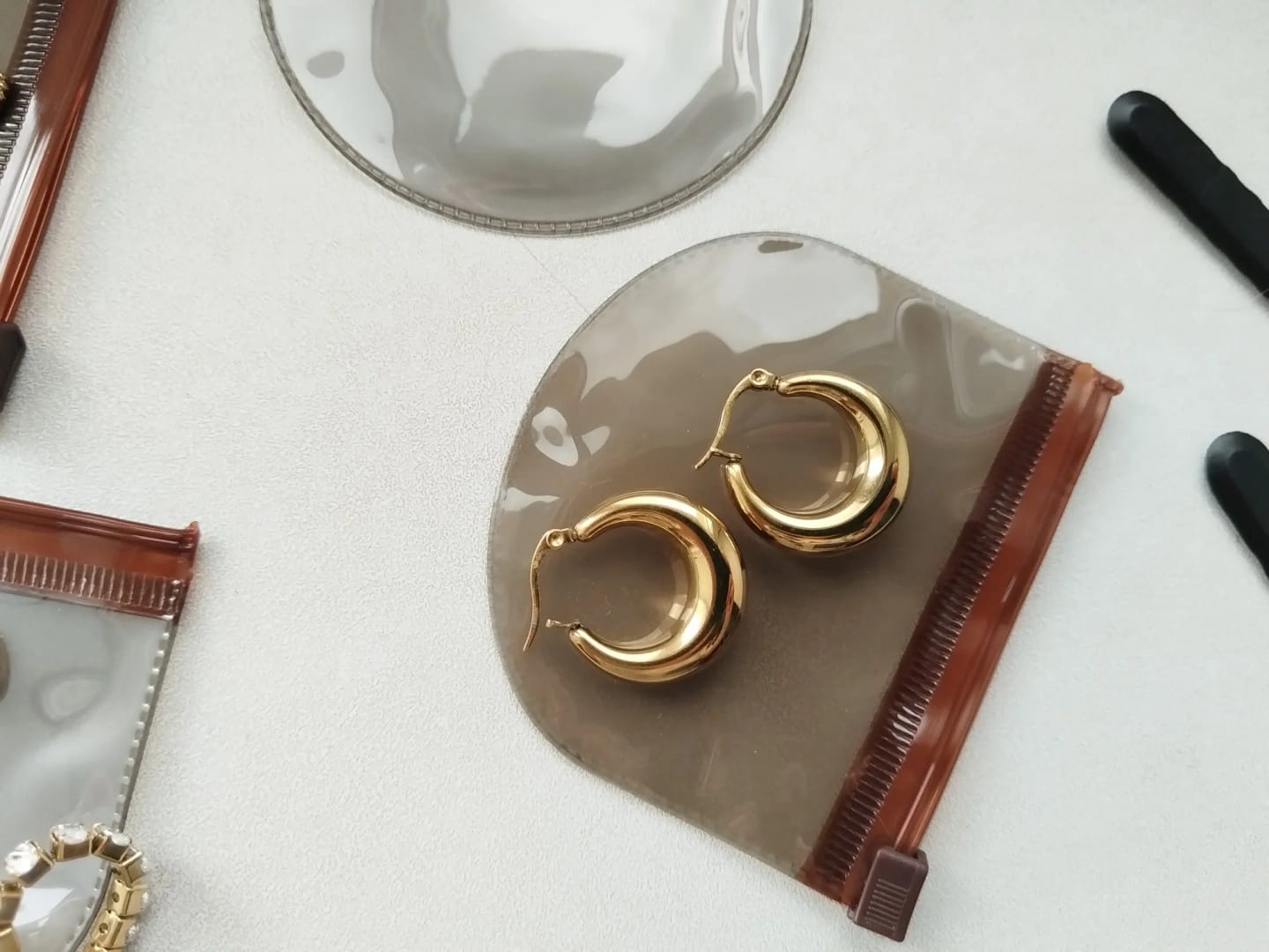 Customer photo review of Modern Edge Golden Hoops