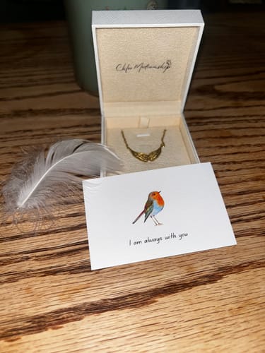 Customer photo review of Angel Wing Necklace for Protection & Guidance