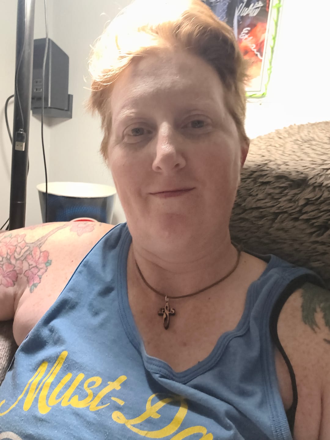 Customer photo review of Holy Land Jesus Name Cross Pendant