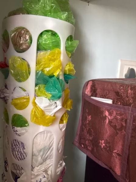 Customer photo review of Wall-Mounted Grocery Bag Dispenser & Multipurpose Kitchen Plastic Bag Organizer