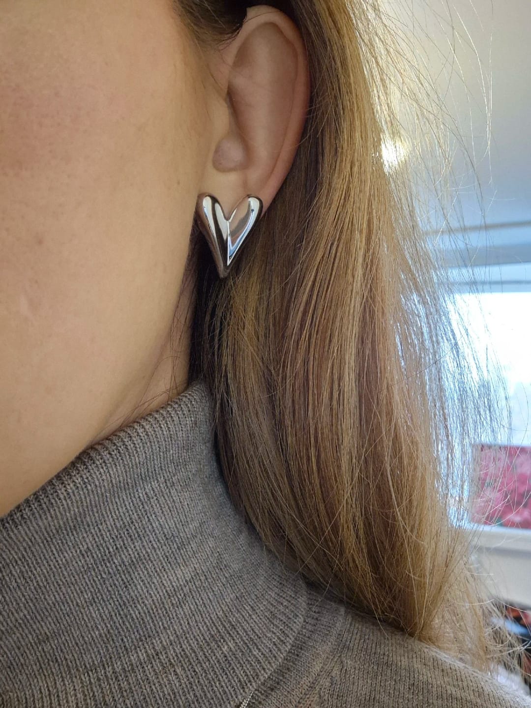 Customer photo review of Sofia's Heart Studs
