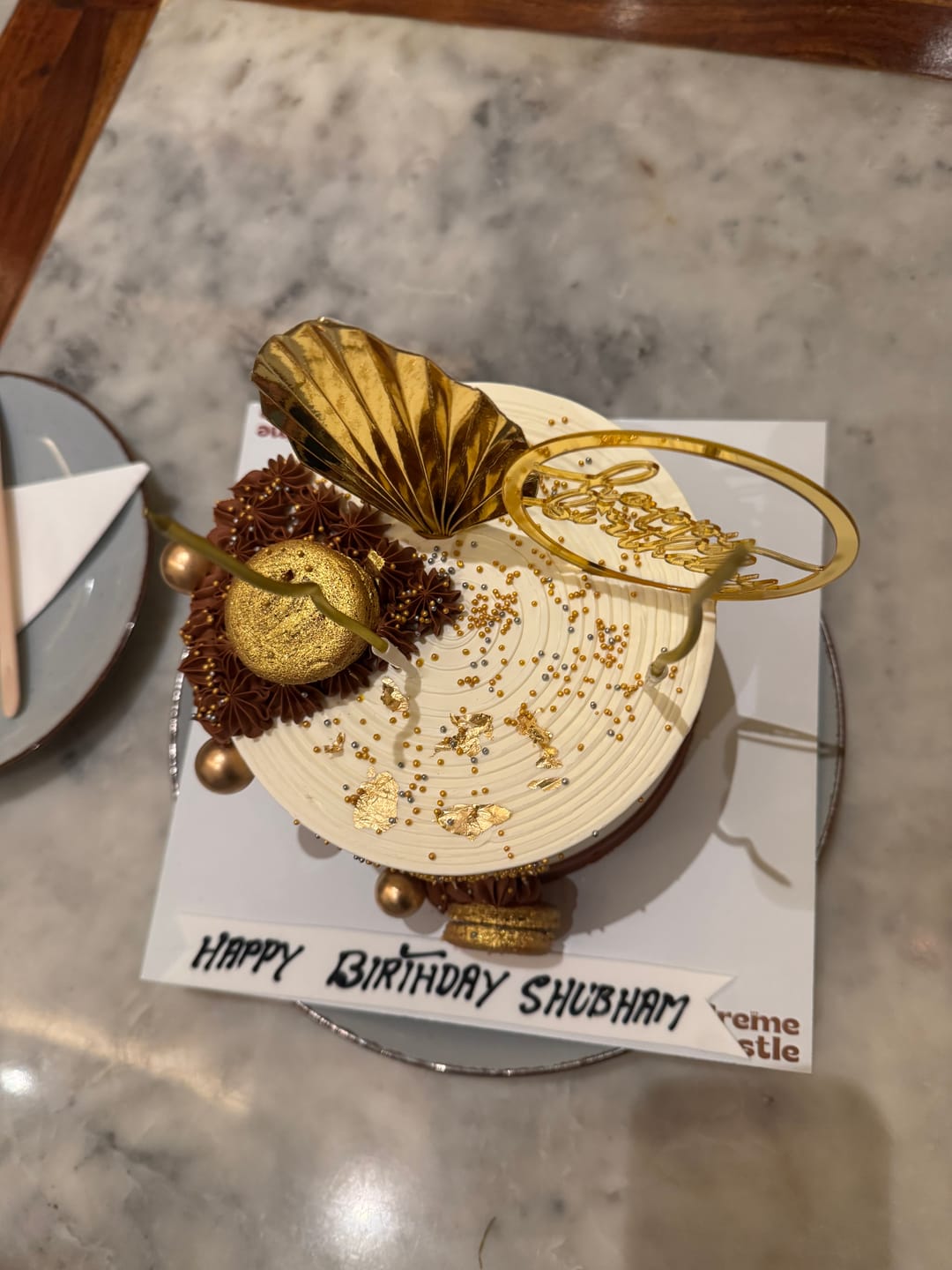 Customer photo review of Golden cake for boyfriend birthday