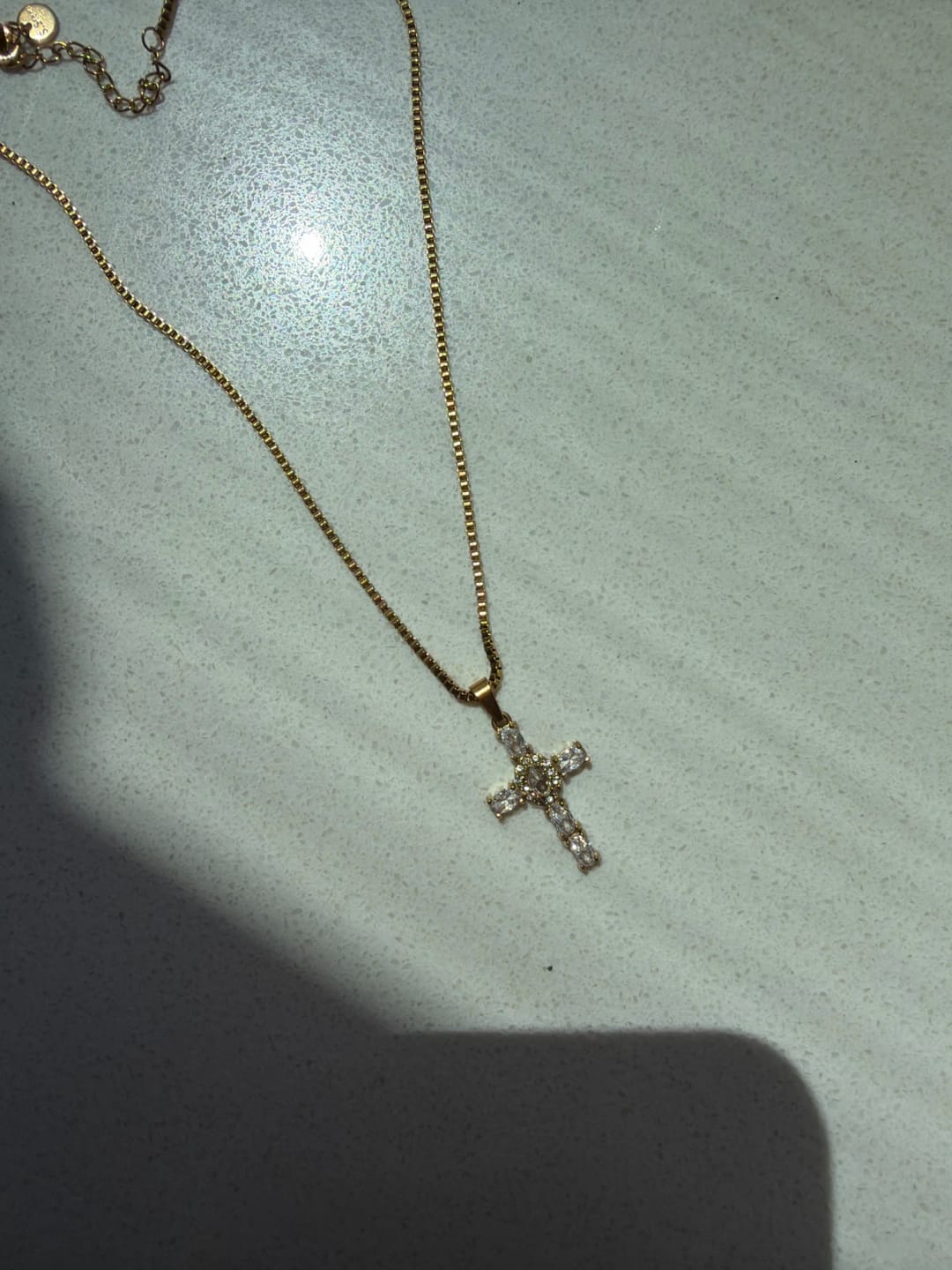 Customer photo review of Halo Glow Cross Necklace