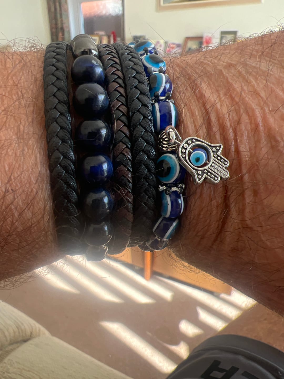 Customer photo review of Buddha Stones Tiger Eye Lava Rock Black Onyx Lazurite Lapis Lazuli Hematite Bead Positive Leather Bracelet