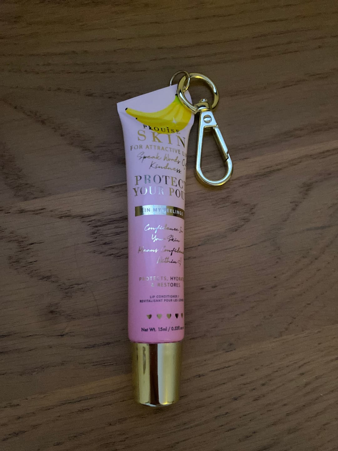 Customer photo review of Protect Your Pout Keychain Lip Conditioner