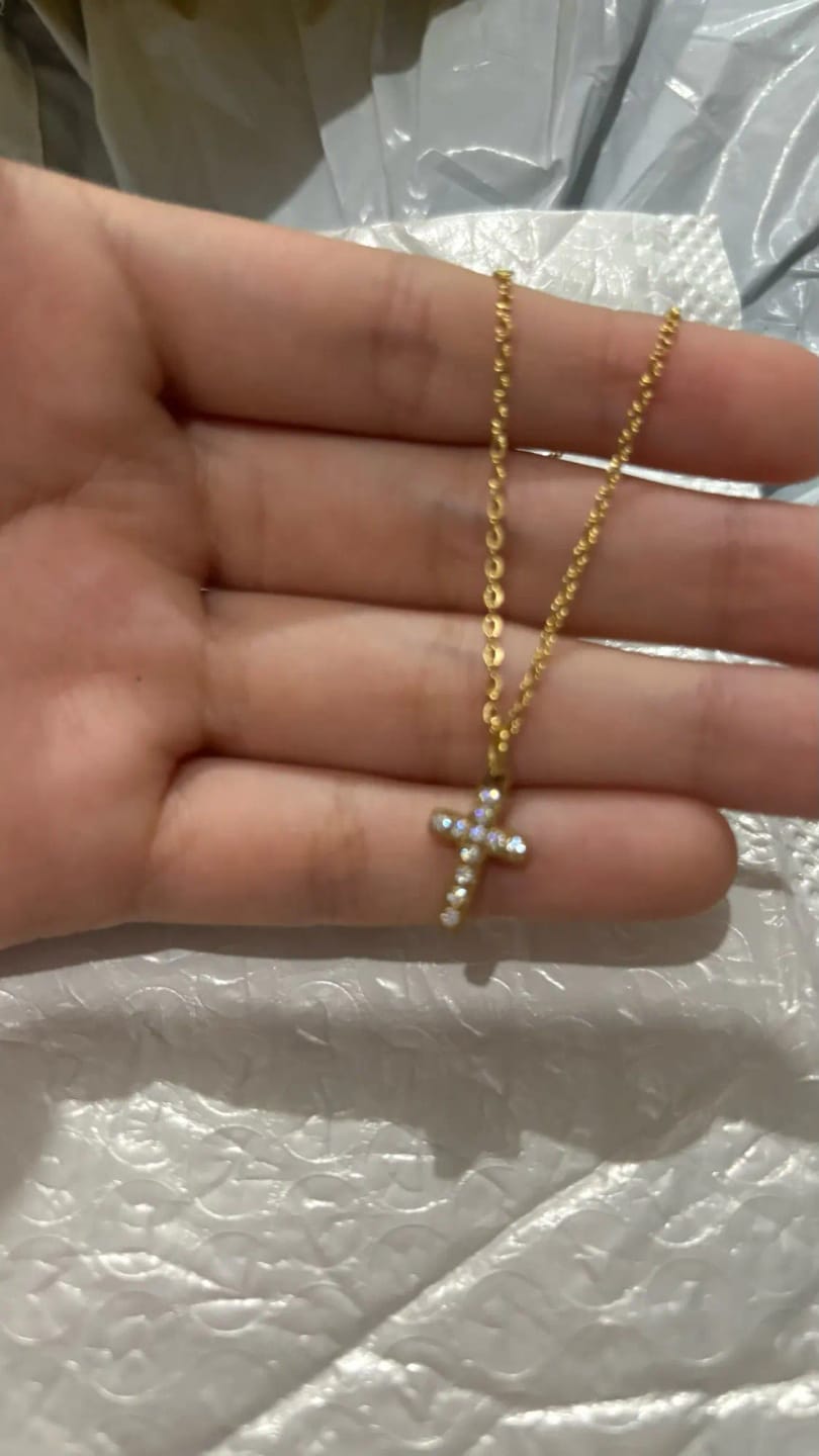 Customer photo review of Halo Glow Cross Necklace