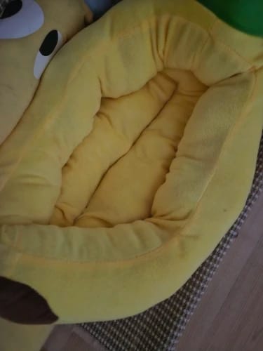 Customer photo review of Plush Banana Pet Bed for Cats and Small Dogs