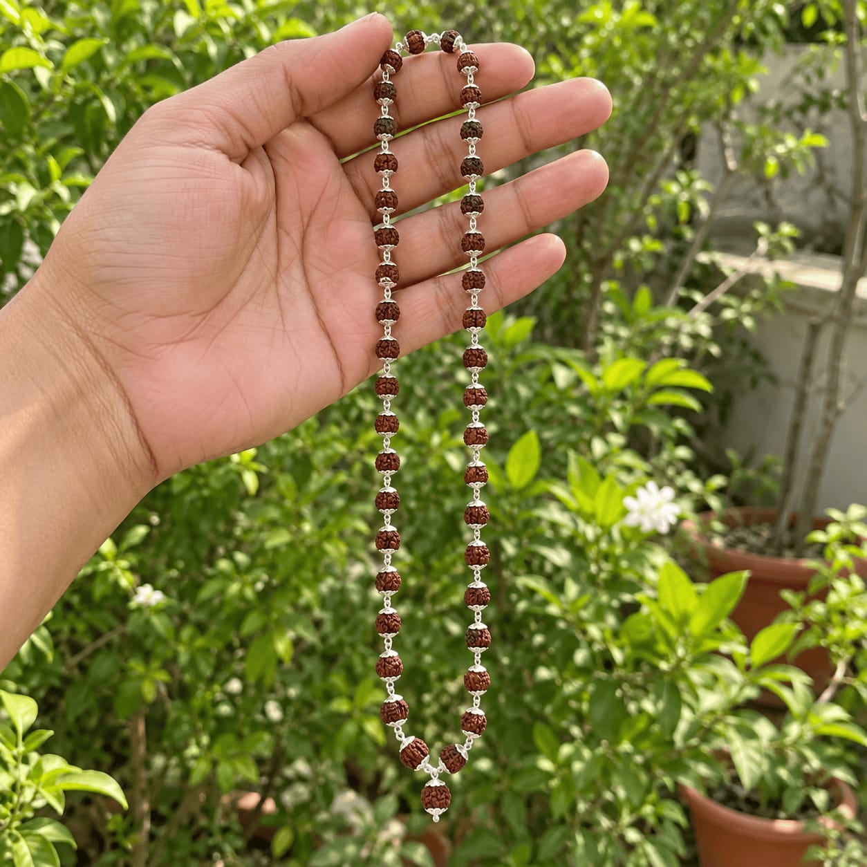 Customer photo review of Rudraksha Silver Mala