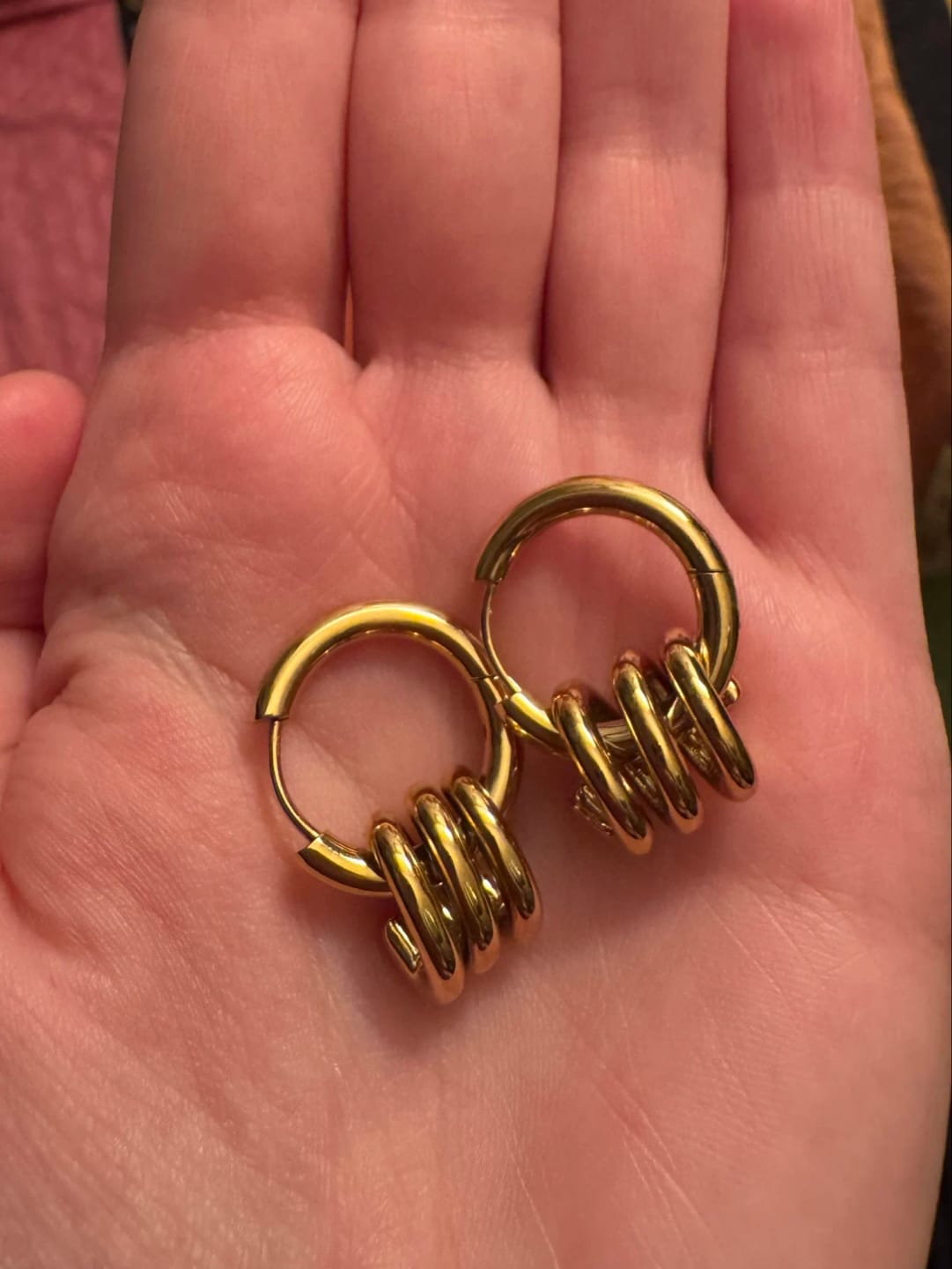 Customer photo review of Twist Wave Gold Splash Earrings
