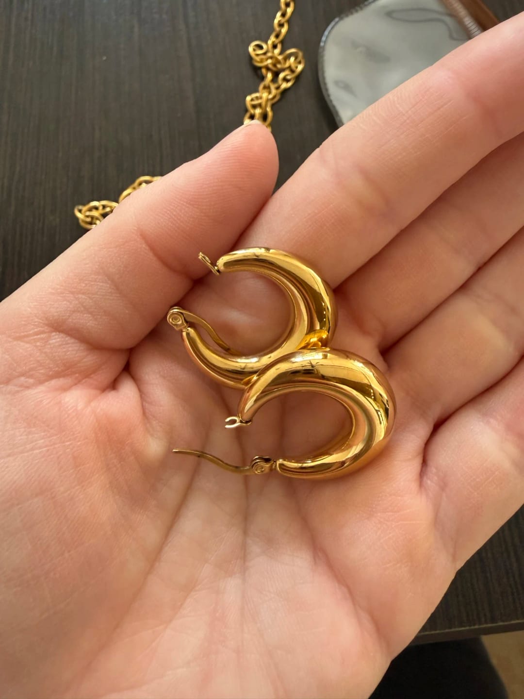 Customer photo review of Modern Edge Golden Hoops