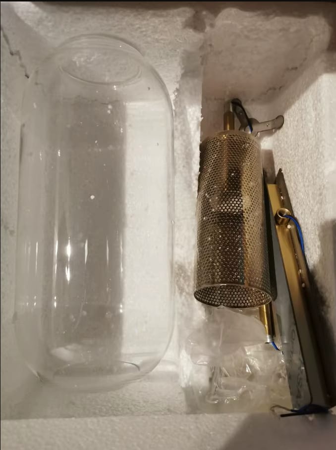 Customer photo review of Gold Tone Glass Wall Light with Hanging Cylinder Shade