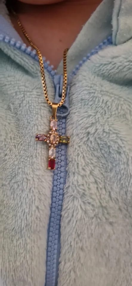 Customer photo review of Halo Glow Cross Necklace