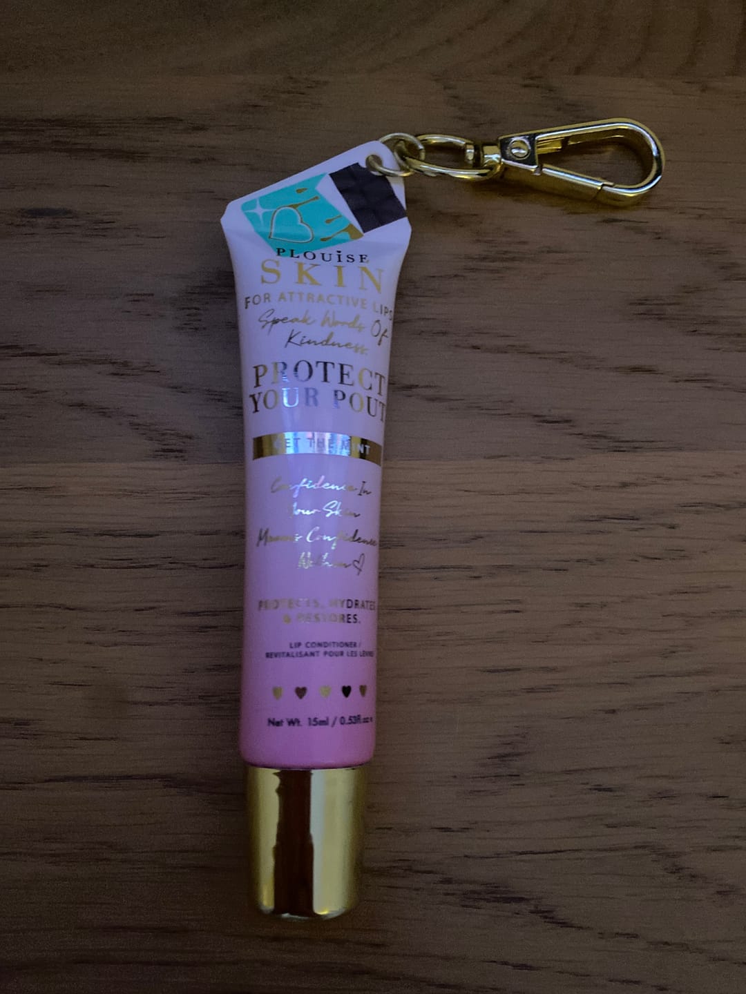 Customer photo review of Protect Your Pout Keychain Lip Conditioner