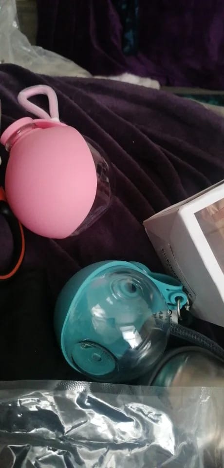 Customer photo review of Travel Dog Water Bottle with Silicone Bowl