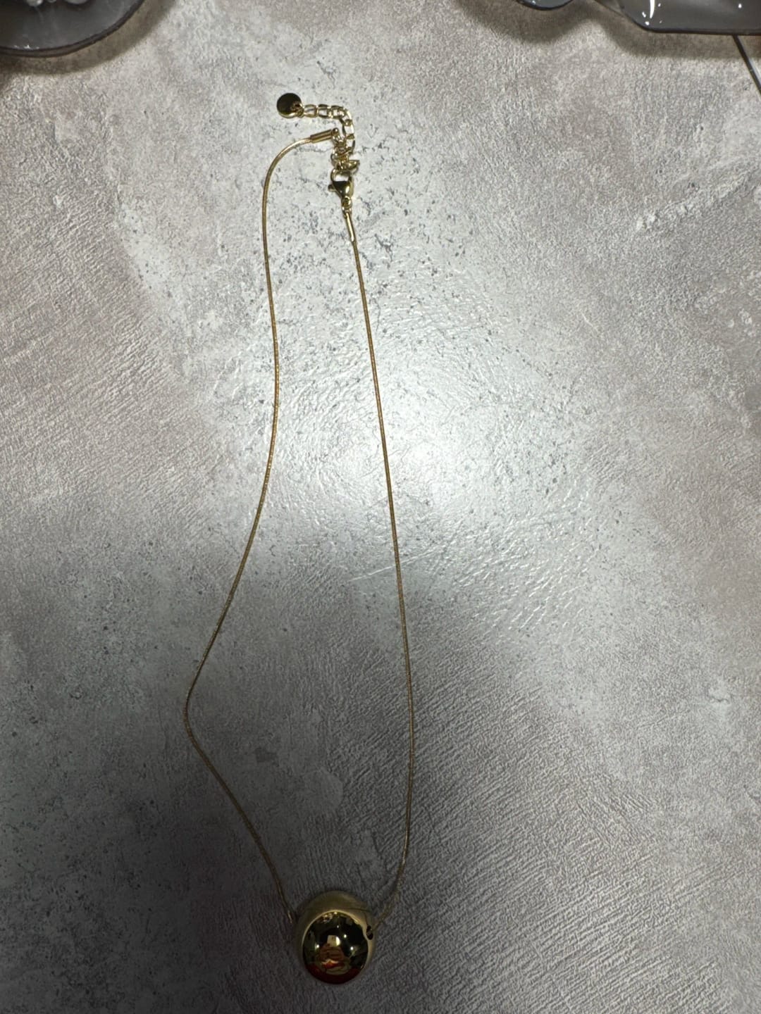 Customer photo review of Eternal Gold Bead Necklace