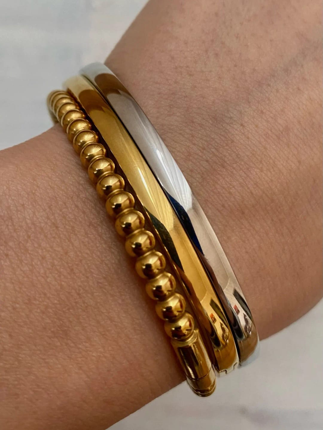 Customer photo review of Golden Smooth Bangle