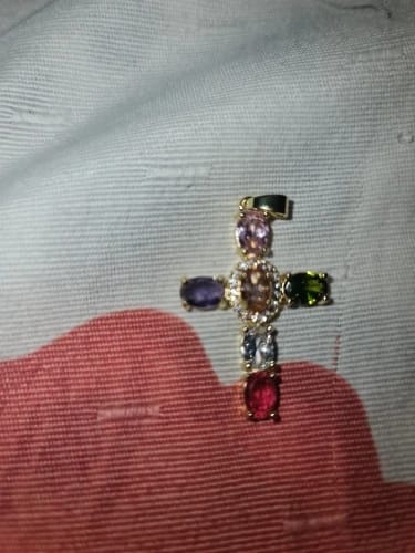 Customer photo review of Halo Glow Cross Necklace