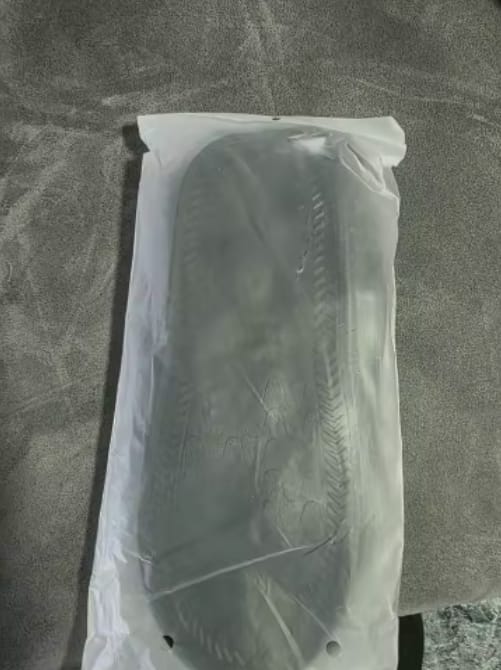 Customer photo review of Cubrebotas impermeable