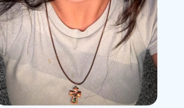 Customer photo review of Holy Land Olive Wood Mother of Pearl Cross Pendant