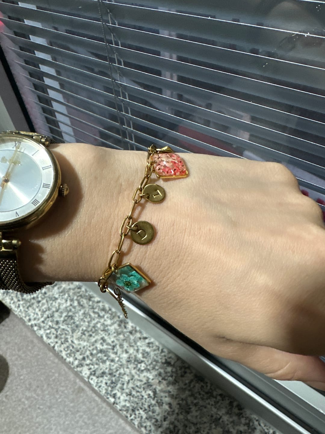 Customer photo review of *Doğum Çiçeği Charm**