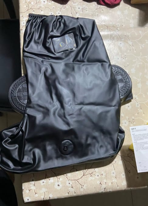 Customer photo review of Cubrebotas impermeable