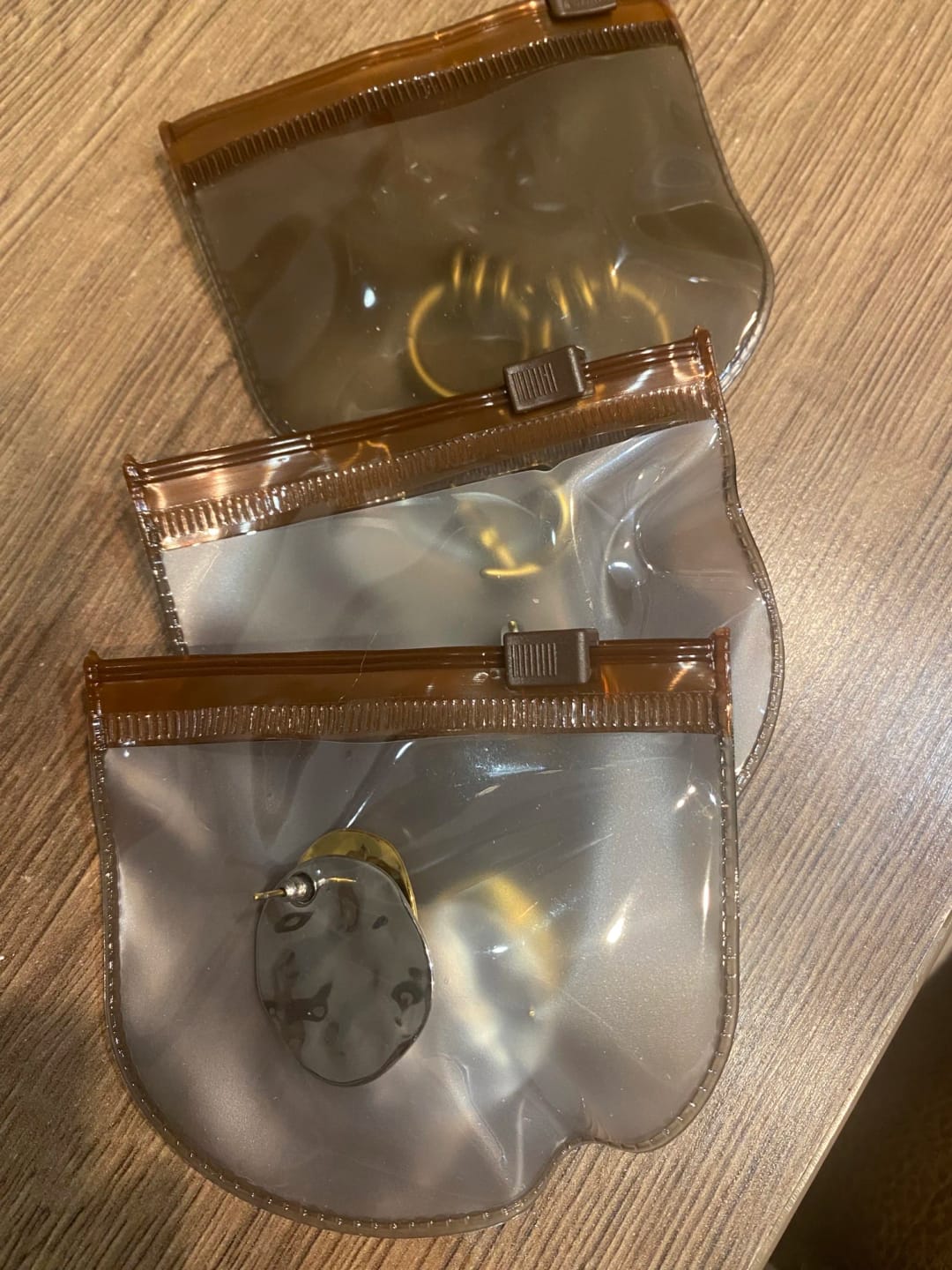 Customer photo review of Twist Wave Gold Splash Earrings